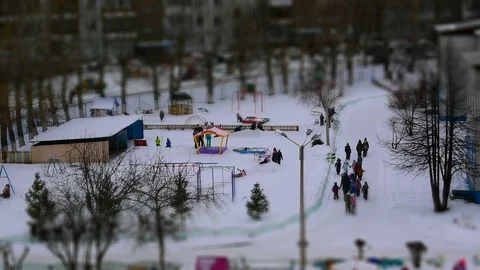 Miniature people in the playground Stock Footage 128406864