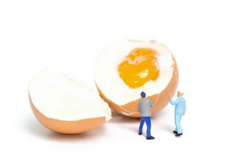 Miniature people work at Easter-eggs for Easter day Stock Photos