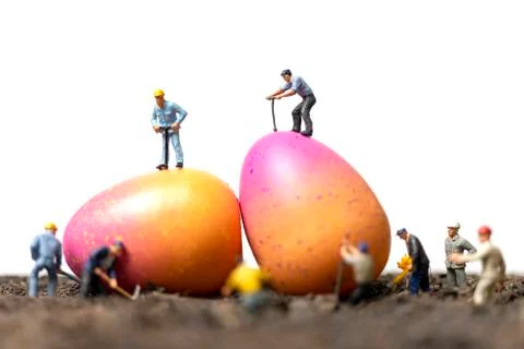 Miniature people work at Easter-eggs for Easter day Stock Photos