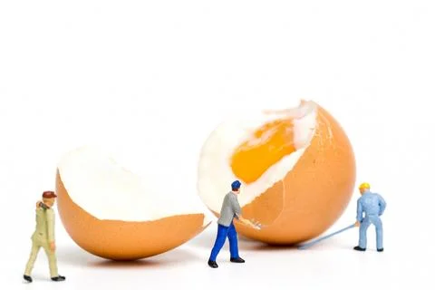 Miniature people work at Easter-eggs for Easter day Stock Photos