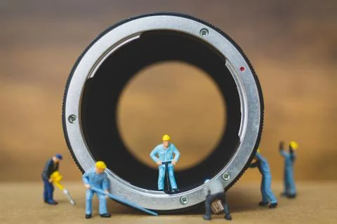 Miniature people : Worker team checking The pipe Stock Photos