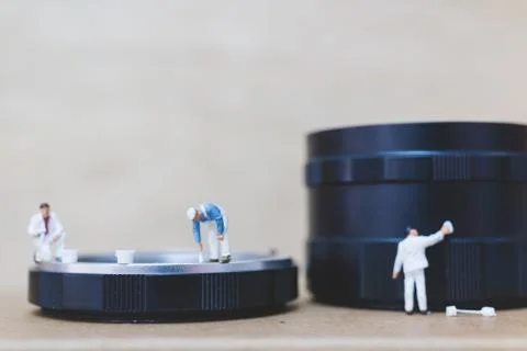 Miniature people : Worker team checking The pipe Stock Photos