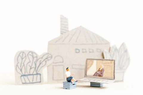 Miniature people working with computer labtop , Work at home concept Stock Photos