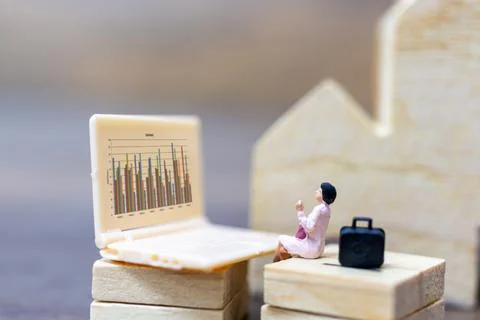 Miniature people working with computer labtop , Work at home concept Stock Photos