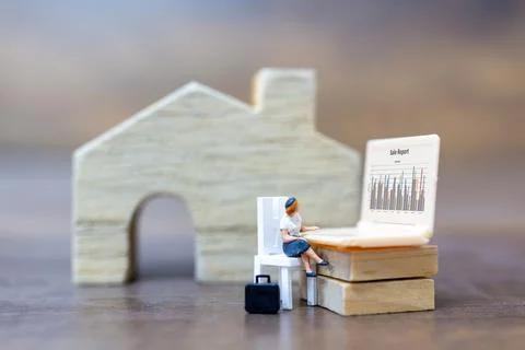 Miniature people working with computer labtop , Work at home concept Stock Photos
