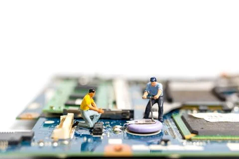 Miniature people working on cpu board, Technology concept Stock Photos
