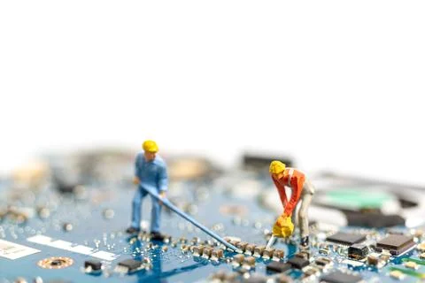 Miniature people working on cpu board, Technology concept Stock Photos