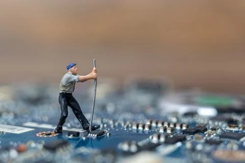 Miniature people working on cpu board, Technology concept Stock Photos