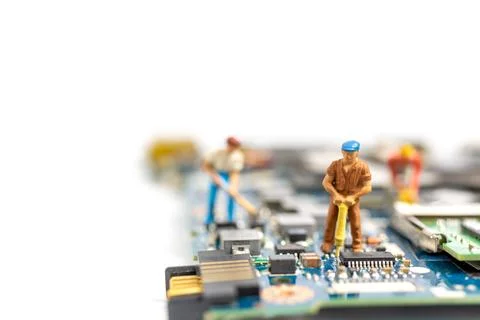 Miniature people working on cpu board, Technology concept Stock Photos
