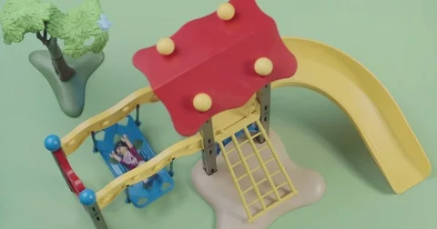 Miniature of playground on green Stock Footage 81799566
