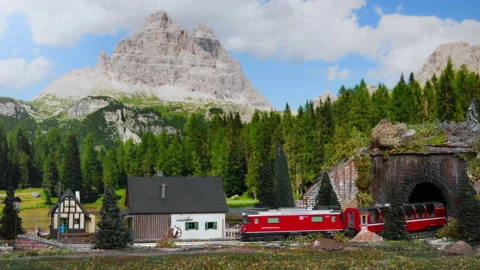 Miniature red train. Model railway. Stock Footage 232426564