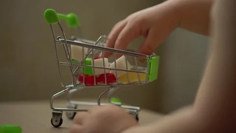A miniature shopping basket Stock Footage 153131426