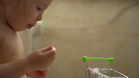 A miniature shopping basket Stock Footage 153131630