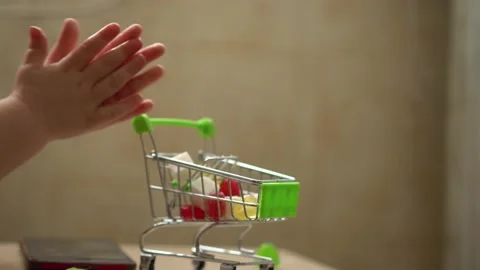 A miniature shopping basket Stock Footage 153131759