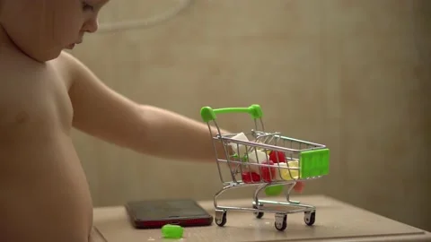 A miniature shopping basket Stock Footage 153131995