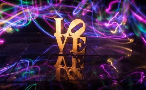 A Miniature Table Scene with Items Symbolizing Love, Relationships, and Rom.. Stock-Illustration