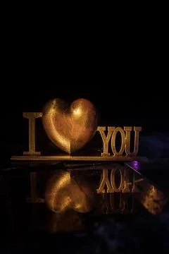 A Miniature Table Scene with Items Symbolizing Love, Relationships, and Rom.. 스톡 사진