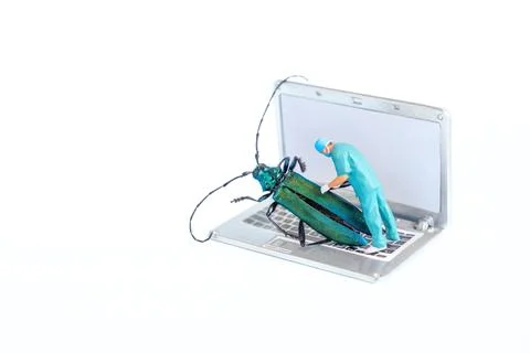 Miniature Technician Fixing Computer Issue With Colorful Beetle Inside Lapt.. Foto stock