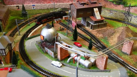 Miniature train. Model railway. train in transit in the industrial area. Stock Footage 153035450
