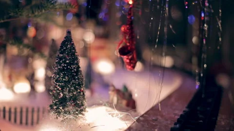Miniature Train under Xmas Tree at Night Stock-Footage 59901241