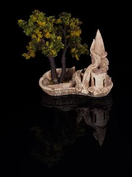Miniature tree in a ceramic pot isolated on black Stock Photos