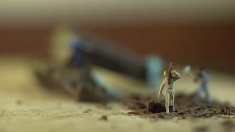 Miniature workers work piece of chocolate 스톡 동영상 127169249