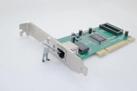 Miniaturized Worker Interacting With Computer Network Card Stock Photos