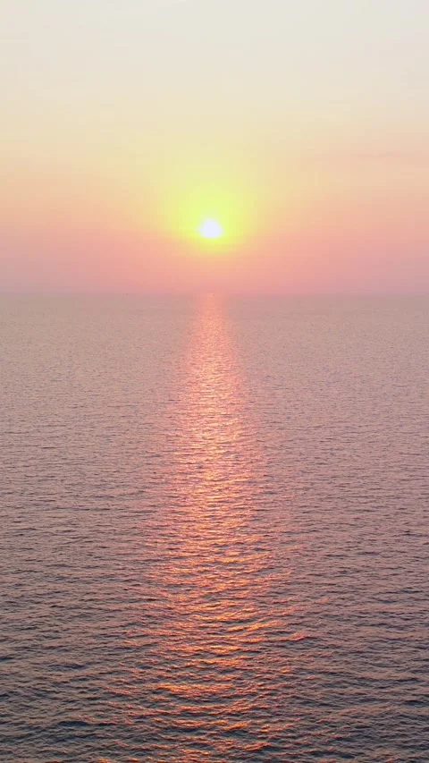 Minimal aerial view of sunset above calm ocean water in Thailand. Stock-Footage 336594650