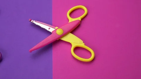 Minimal background with moving colorful wavy blade scissors. Stock Footage 112129365