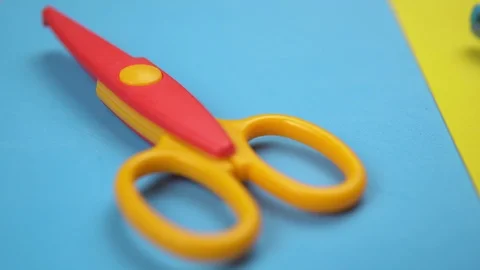 Minimal background with moving colorful wavy blade scissors. Stock Footage 112129532