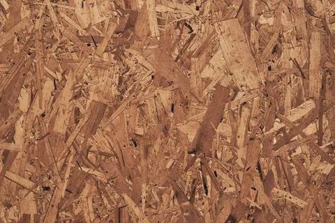 Minimal background with a pattern of pressed sawdust. Minimalistic background Stock Photos