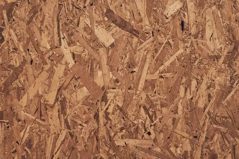 Minimal background with a pattern of pressed sawdust. Minimalistic background Stock Photos