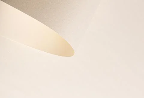 Minimal beige interior surface with soft curved shadow. Abstract wall texture Stock Photos