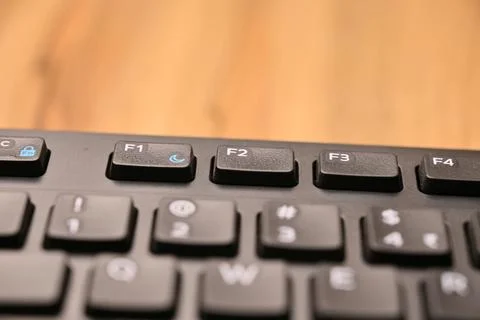 Minimal Black Keyboard Macro Composition Highlighting F2 Function Key in So.. 写真素材