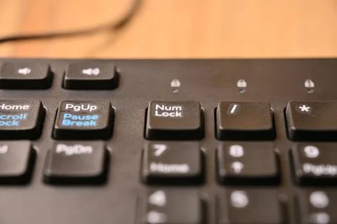 Minimal Black Keyboard Macro Composition Highlighting Num Lock Key on Numer.. Stock Photos