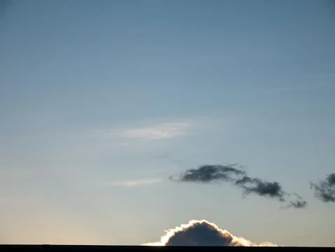 Minimal Blue Sky with Dramatic Cloud at Sunset Foto stock