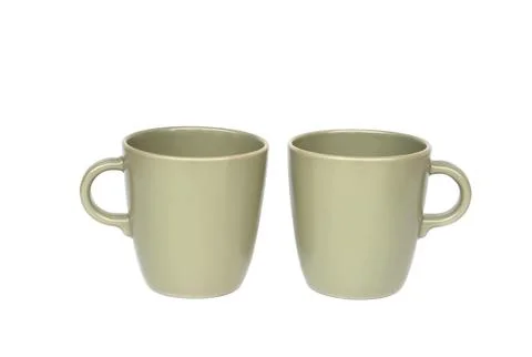 Minimal ceramic tableware set including two matte green mugs, white bowl, small  Stock Photos