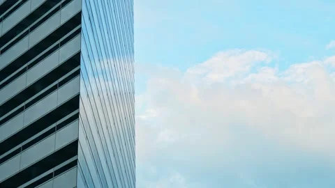 Minimal composition glass office facade edge against soft cloud sky clean c.. Stock Footage 333759237
