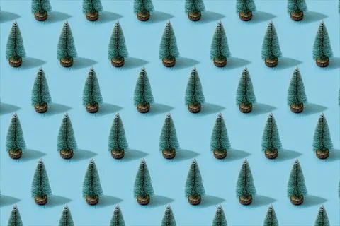 Minimal composition pattern background of green Christmas trees on pastel ... 写真素材
