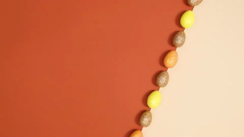 Minimal concept of Easter eggs appear and move. Stop motion flat lay Видео 150282427