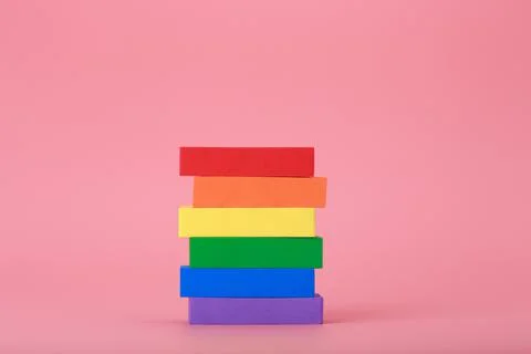 Minimal creative Lgbtq plus concept against pink background Stock Photos