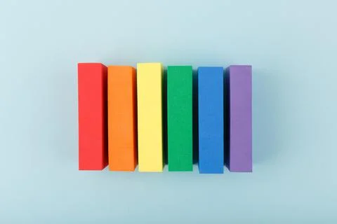 Minimal creative Lgbtq plus concept against pastel blue background Stock Photos