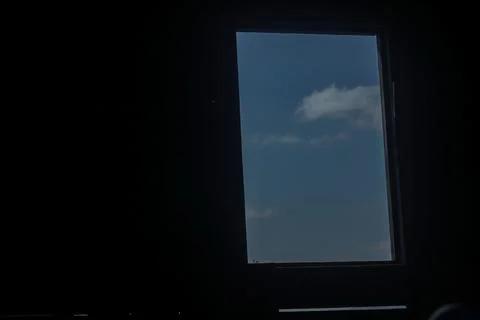 Minimal Dark Interior Window With Blue Sky View 스톡 사진