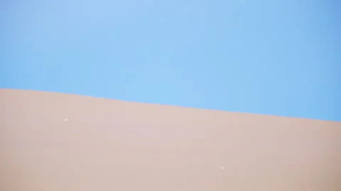 Minimal Desert Sand Dune with Blue Sky Background Stock Footage 326017121