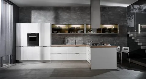 Minimal design white kitchen in a grey interior Stock Photos