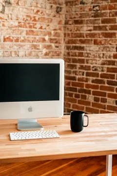 Minimal desk setup with a retro Mac Foto stock