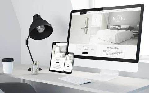 Minimal desktop with responsive hotel website on devices Stock Illustration