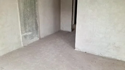 Minimal Empty Apartment Room With Unfinished Walls and Doorway 動画素材 336298465