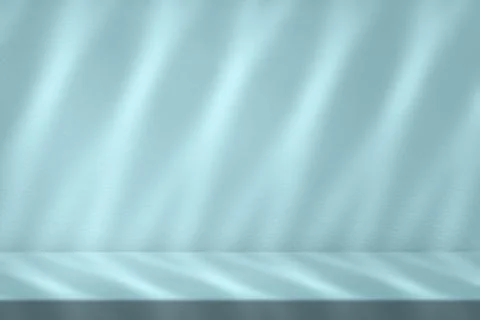 Minimal Empty Table with Light Beam and Shadow on Light Shade of Cyan Wall Foto stock