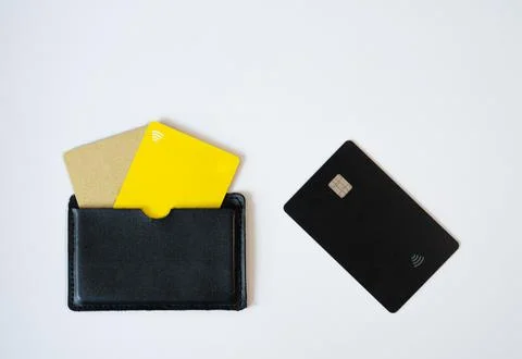 Minimal flat lay with notebook, card, wallet on desk. Modern lifestyle, bank Stock Photos
